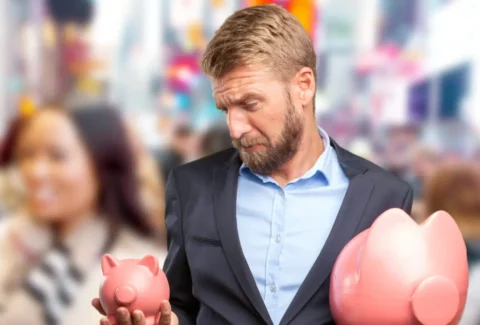 blond businessman sad expression